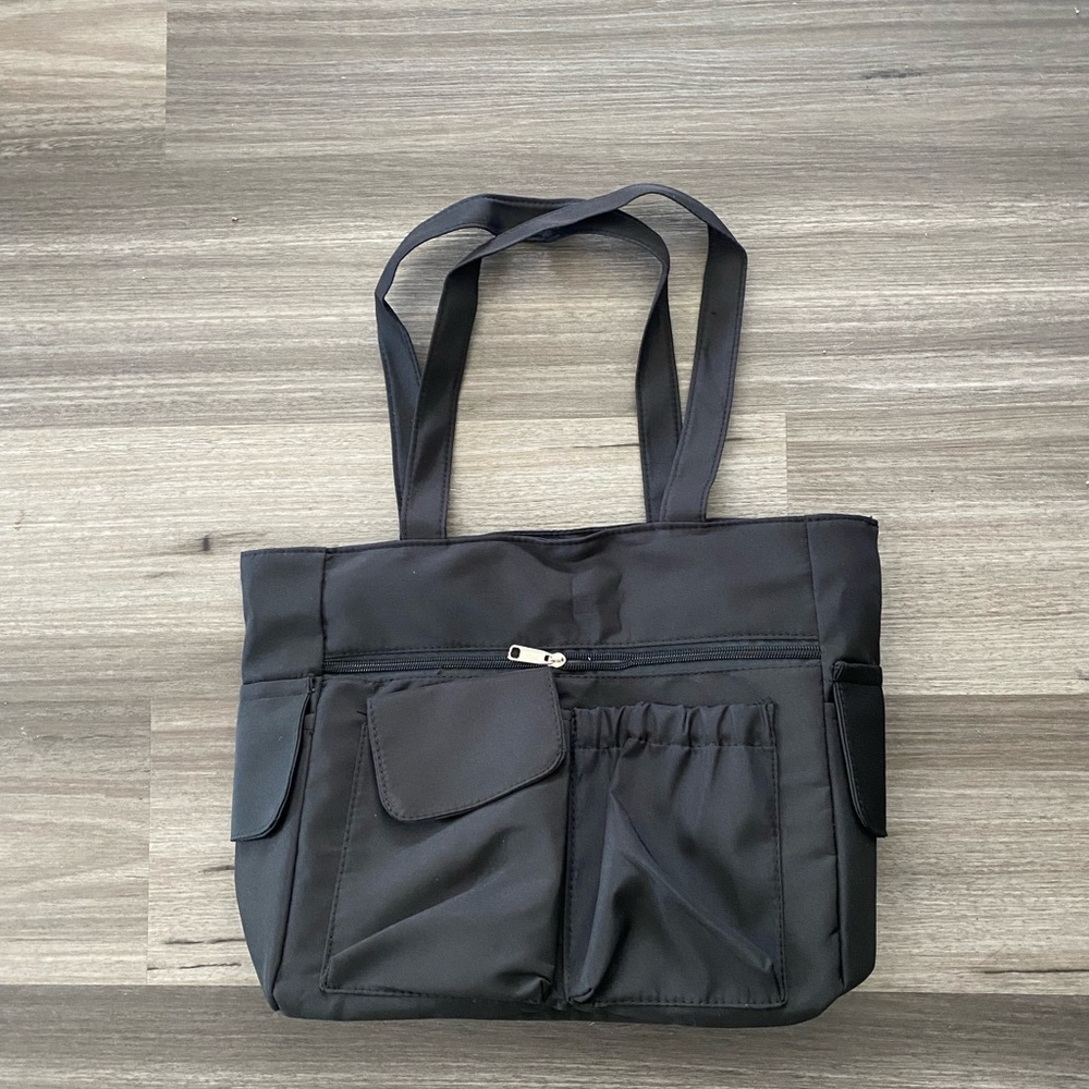 Black Tote Bag with Multiple Front Pockets